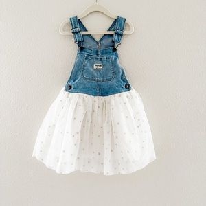 Denim and white jumper dress by Oshkosh B’gosh.